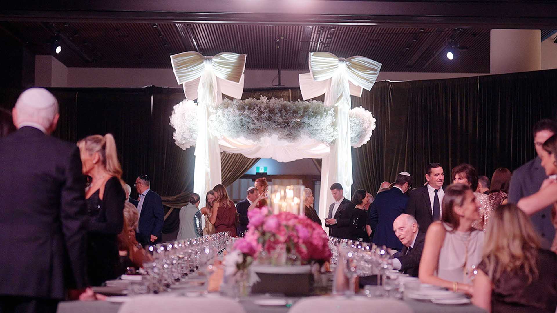 Sophie and Jay during the bedeken veiling ceremony at the family home in Melbourne