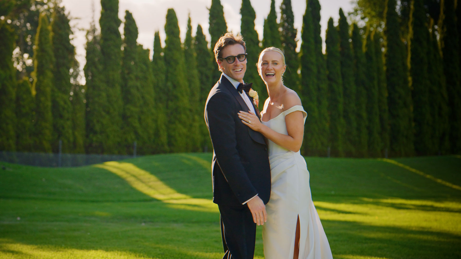 Couple during golden hour at their wedding reception