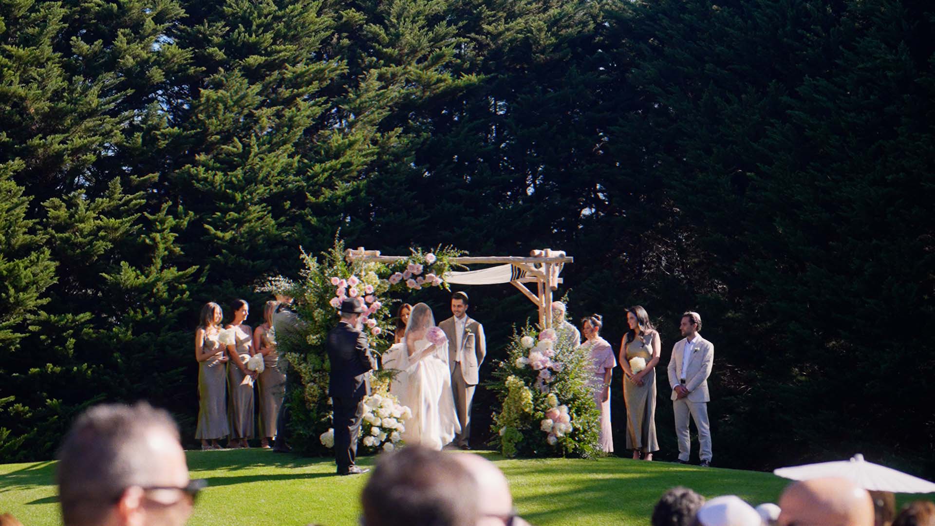 Vineyard backdrop at Taylor and Kelsey's Pt. Leo Estate wedding ceremony on the Mornington Peninsula
