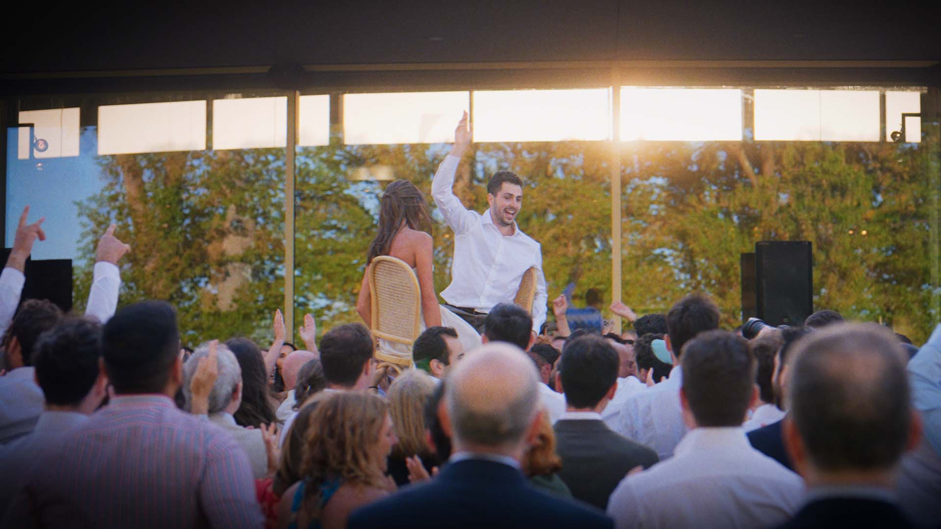 Dancefloor with doof sticks at Taylor and Kelsey's Pt. Leo Estate wedding reception