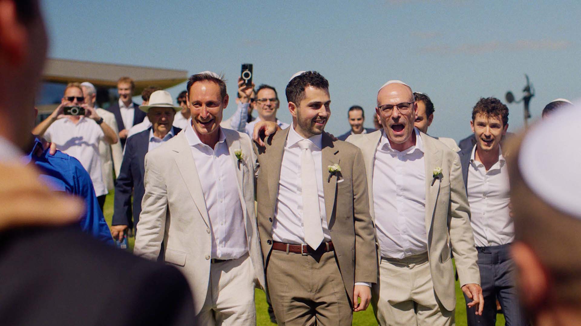 content creators capturing moments at wedding