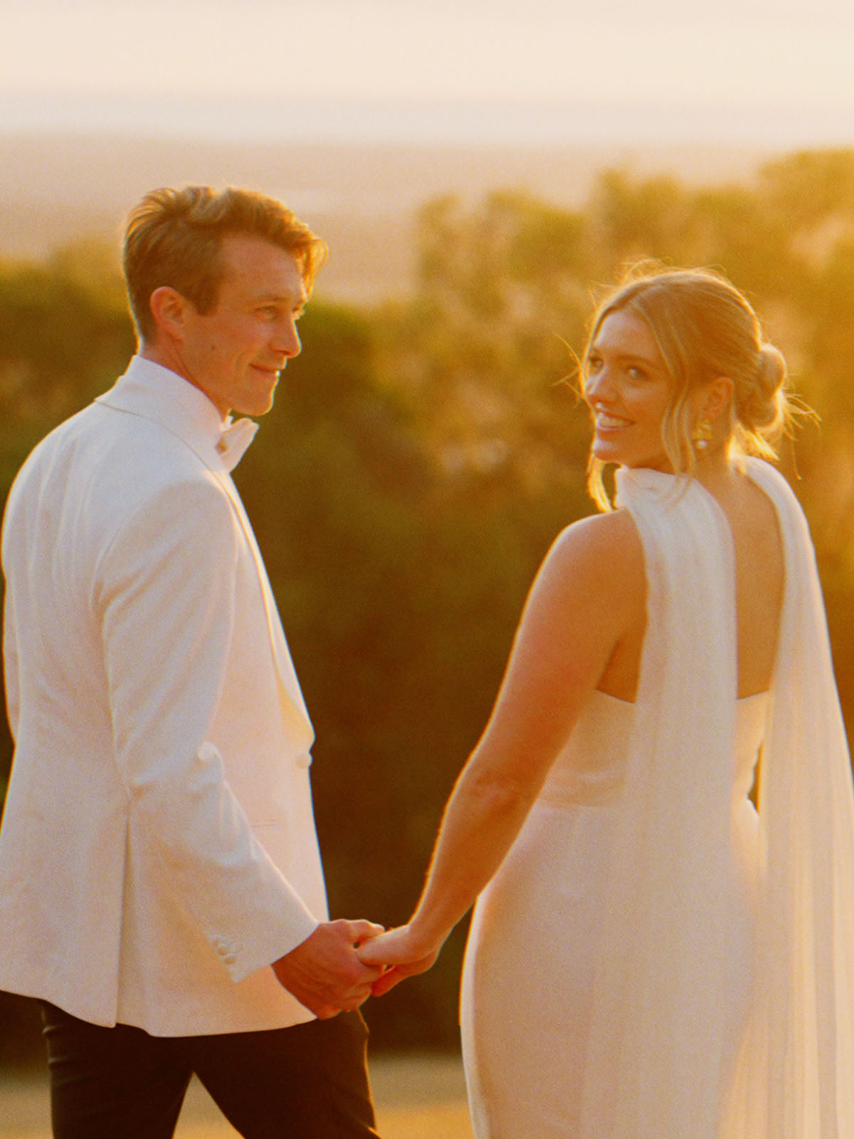 A couple on their wedding day, a still from a Sea of Love wedding film