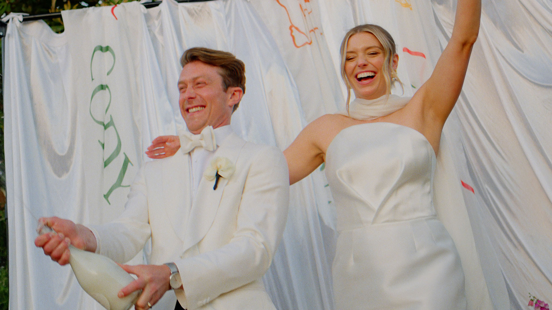 A couple during their wedding ceremony, captured on film