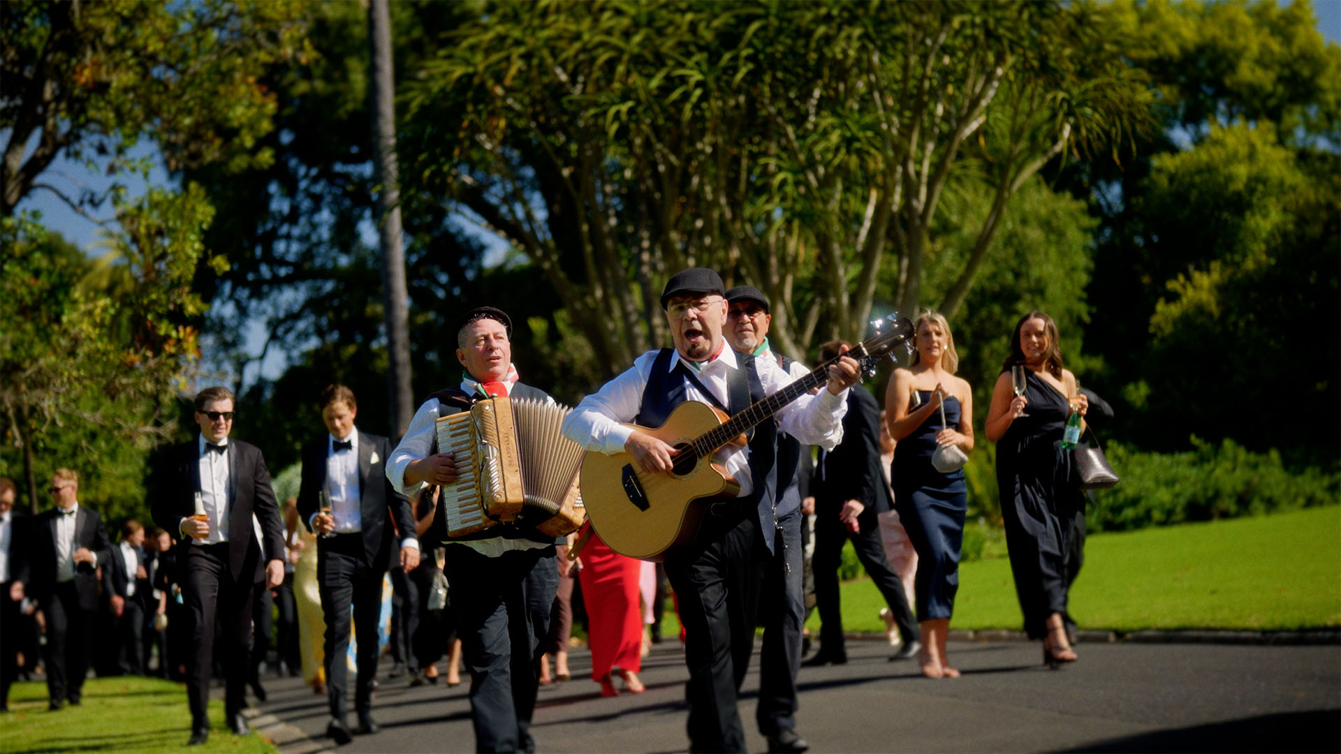 wedding band serenading bride and groom  
